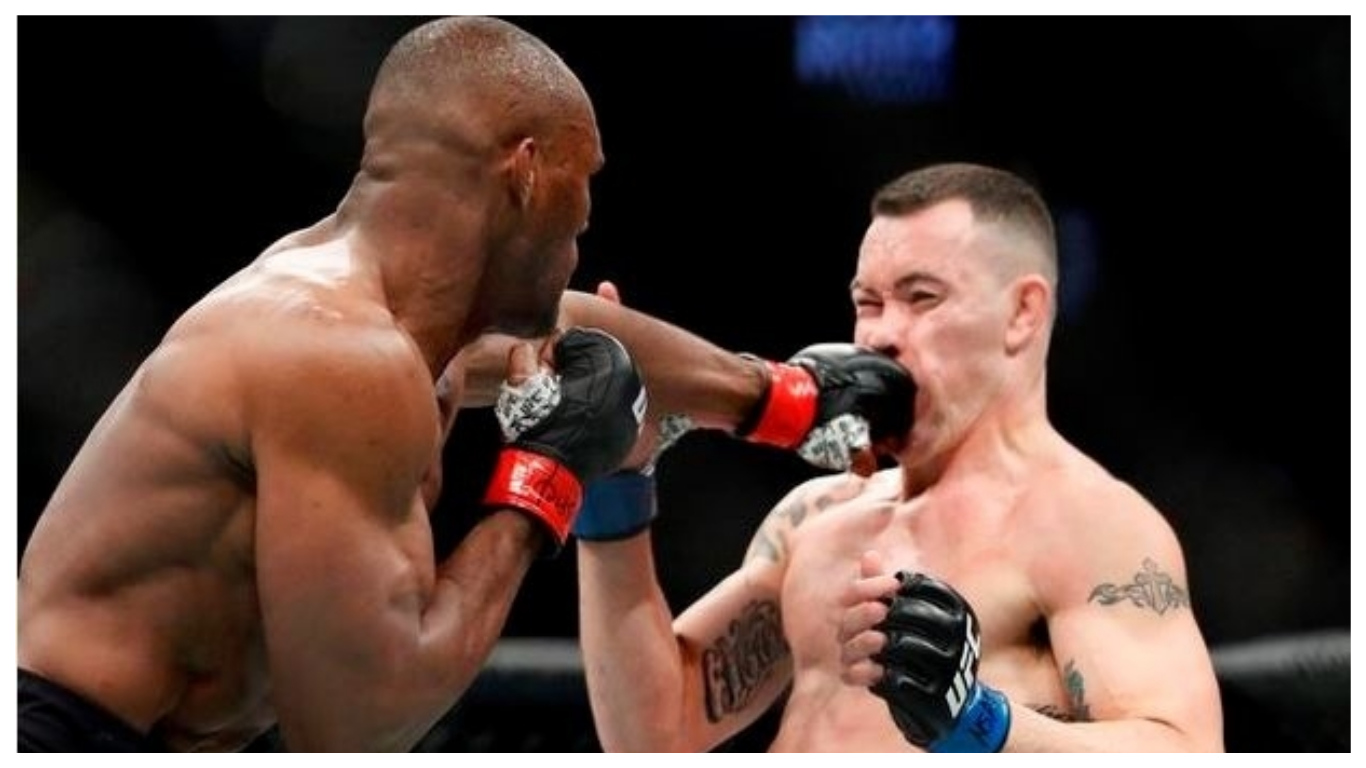 Kamaru Usman hits Colby Covington in a mixed martial arts welterweight championship